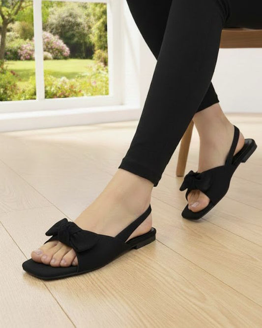 SoftStep Bow Accent Sandals